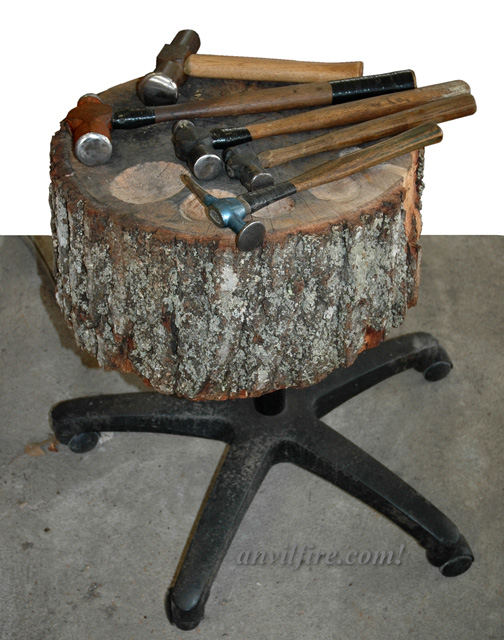 hammers displayed on repousse stump