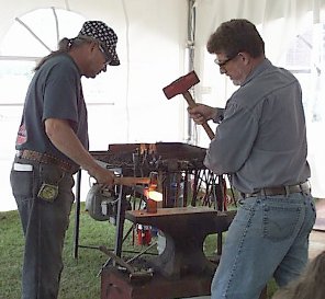 Frank Turley with Striker cutting hammer punch -1.